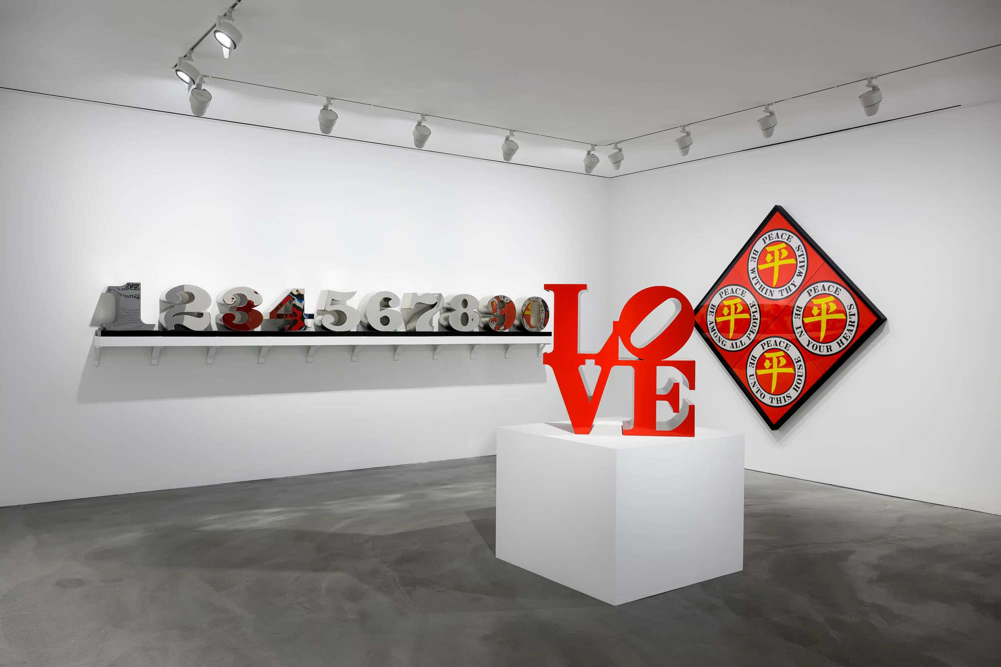 Installation view of The Shape of the World by Robert Indiana