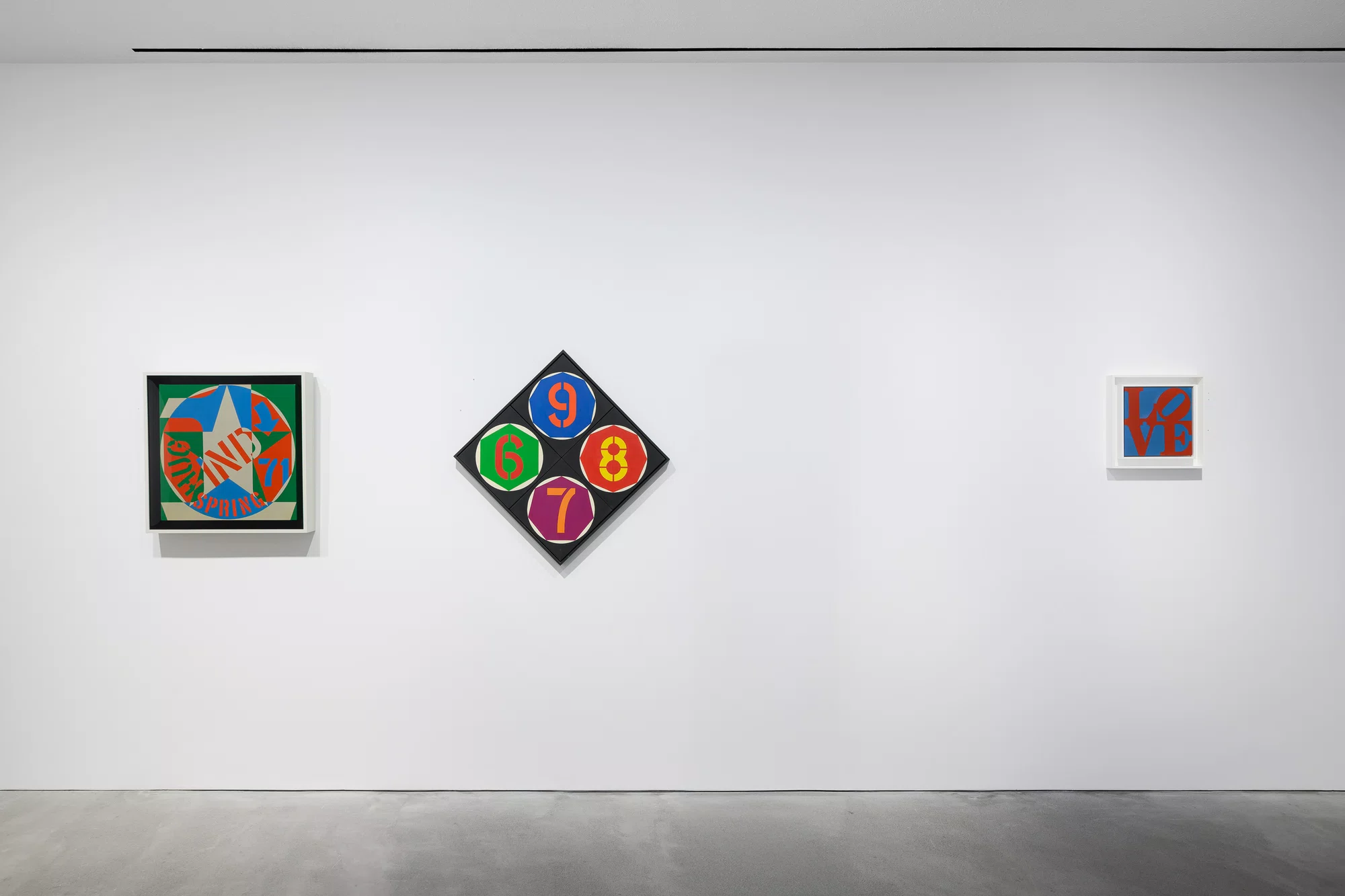Installation view of The Shape of the World by Robert Indiana