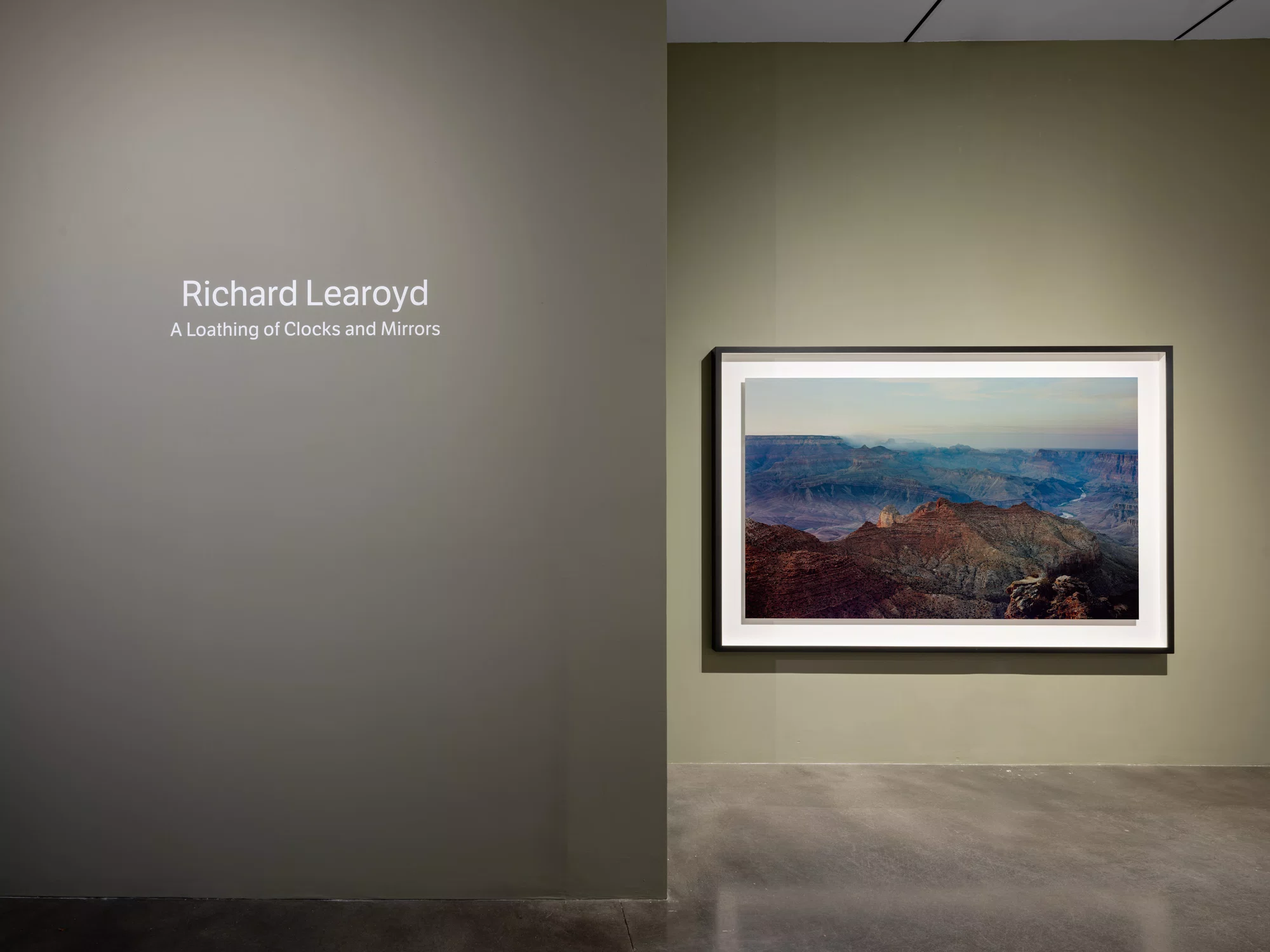 Installation view of A Loathing of Clocks and Mirrors by Richard Learoyd